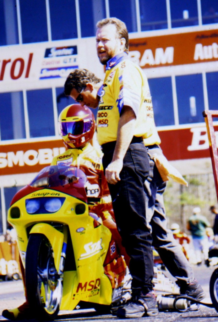 George Bryce, Ken Johnson and the late John Myers prepare to do battle as George gives the race track one final look before unleashing John Myers. From 1989 to 1998 Myers amassed 33 national event wins and qualified number one 38 times during his career. Photo © Tom McCarthy