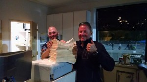 Maryland International Raceway's Chris and Jason Miller proudly count a giant stack of over 800 entries. 