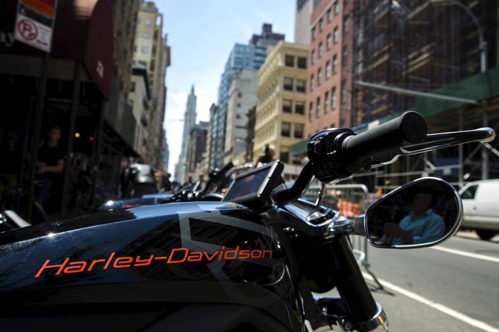 An electric Harley Davidson motorcycle stands on a street in New York