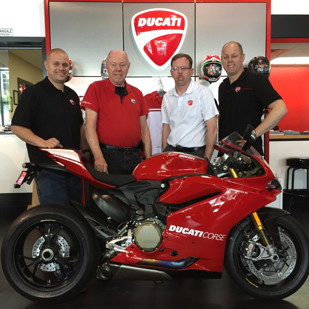 From left - Romy Ruette Ducati Sales Manager; Richard Alexander Sr. President; Duane Alexander General Sales Manager; Richard Alexander Jr. General Manager.