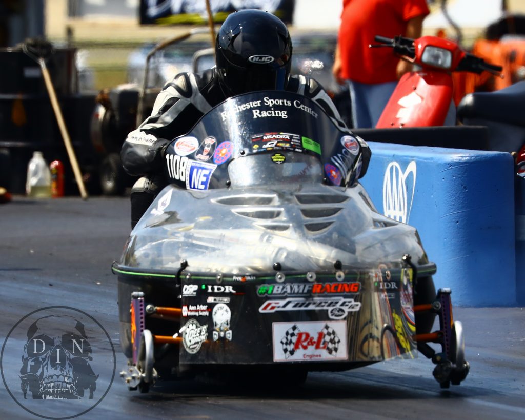 Carl Cicchetto – Hard Launch by Carl Cicchetto on his drag sled at New England Dragway during the annual New England Dragway Motorcycle Masters competition. Tom McCarthy photo.