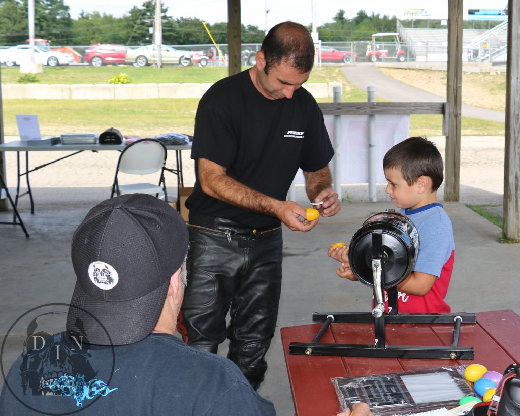 Tony Ficher gets a little help from his son is choosing a name during the Masters selection process. Tony was runner-up in year one of the Master race and he made it to the Semi-Finals this year. Pat Sullivan photo.