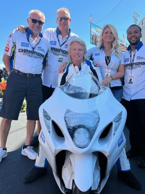 Chris Bostick and his team. (L to R): Les Stimac, Jim Gottmann, Chris Bostick, Teri Bostick, Richard Gadson (Photo credit: Chris Bostick Motorsports)