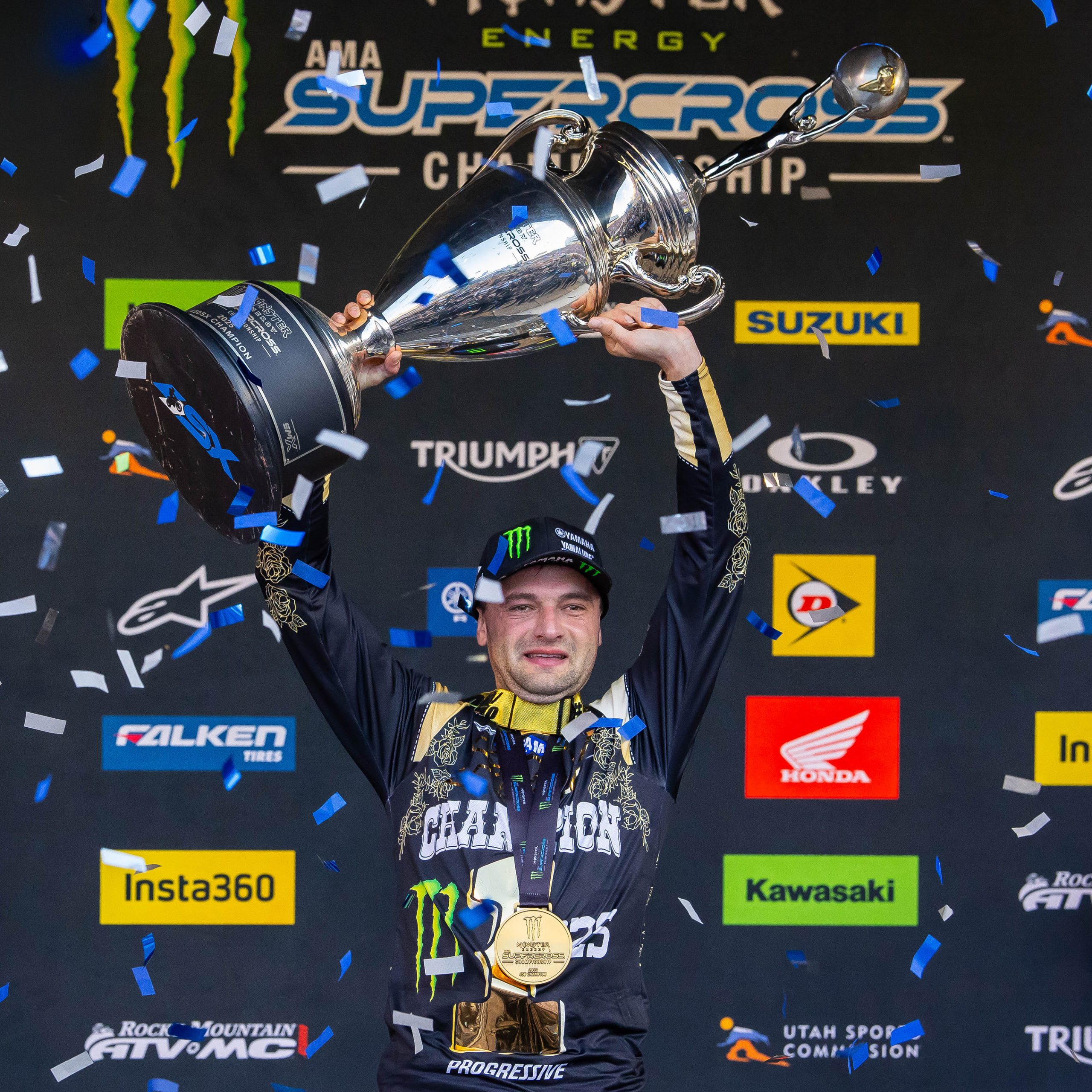 Cooper Webb celebrates on the podium at Rice-Eccles Stadium in Salt Lake City on May 10 after winning the Monster Energy AMA Supercross Championship.